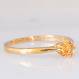 Solitario vintage in oro giallo 9K con spessartite (0.27ct ca.)