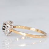 Anello a margherita vintage in oro giallo e bianco 9K con zaffiro (0.30ct ca.) e diamanti (0.10ctw ca.), anni ‘80