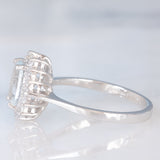 Anello a margherita in oro bianco 9K con acquamarina (1ct ca.) e diamanti di taglio brillante (0.16ctw ca.), anno 2006