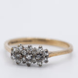 Anello vintage a fiore in oro giallo 9K con diamanti (0.15ctw ca.)