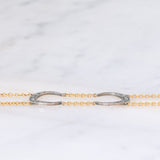 Vintage 18K yellow gold and silver semi-rigid bracelet with crescent-shaped decorations and rose-cut diamonds, 50s
