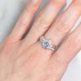 Anello a margherita vintage in platino con zaffiro stellato (0.71ct) e diamanti (0.27ctw), anni ‘80/‘90