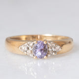Vintage 9K yellow gold band ring with tanzanite (0.40ct approx.) and diamonds (0.12ctw approx.), year 2004