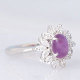 Anello a margherita vintage in platino con rubino (1.61ct) e diamanti (0.60ctw), anni ‘80/‘90
