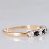 Bague vintage en or jaune 9 carats avec saphirs (environ 0.18 ct au total) et diamants taille brillant (environ 0.16 ct au total), année 1987
