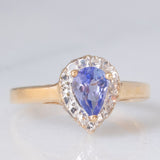 Anello a margherita vintage in oro giallo e bianco 9K con tanzanite (0.60ct ca.), anni ‘90