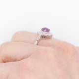 Anello a margherita vintage in platino con rubino stellato (1.35ct) e diamanti (0.66ctw ca.), anni ‘90