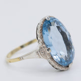 Anello da cocktail Art Déco in oro giallo 14K e argento con spinello azzurro (7.50ct ca.), anni ‘30