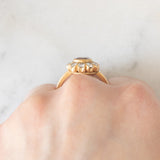 Anello a margherita vintage in oro giallo 18K con zaffiro rosa (1.70ct ca.) e diamanti di taglio brillante (1ctw ca.), anni ‘60/‘70