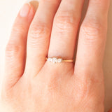 Vintage-Trilogie aus 9-karätigem Gelbgold mit Diamanten im Brillantschliff (ca. 0.25 ctw), ca. 70er/80er Jahre.