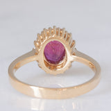 Anello a margherita vintage in oro giallo 14K con rubino (1.50ct ca.) e diamanti (0.16ctw ca.), anni ‘70/‘80