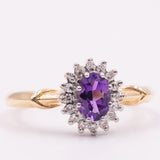 Anello a margherita vintage in oro giallo 9K con ametista (0.40ct ca.) e diamanti (0.16ctw ca.), anni ‘80/‘90