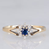 Anello a margherita vintage in oro giallo 9K con zaffiro (0.10ct ca.) e diamanti (0.08ctw ca.), anno 1987