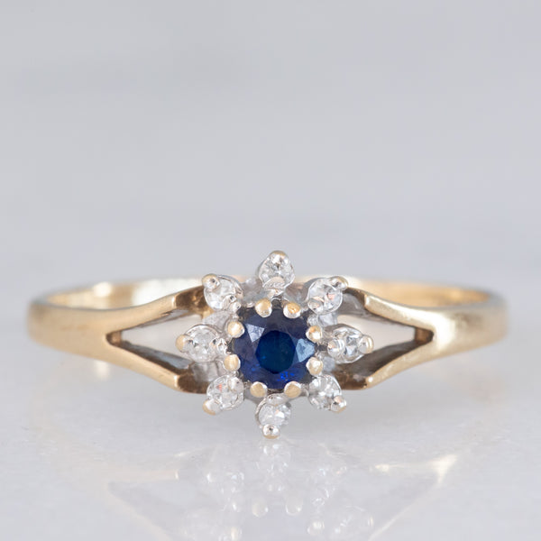 Anello a margherita vintage in oro giallo 9K con zaffiro (0.10ct ca.) e diamanti (0.08ctw ca.), anno 1987