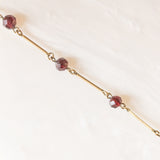 Collana vintage in oro giallo 8K e granati, anni ‘50/‘60