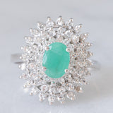 Vintage-Gänseblümchenring aus 14-karätigem Weißgold mit Smaragd (ca. 0.50 ct) und Diamanten (ca. 0.44 ctw), 80er/90er Jahre