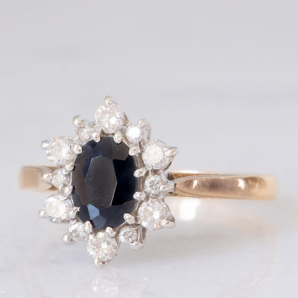 Anello a margherita vintage in oro giallo 9K con zaffiro (1ct ca.) e diamanti di taglio brillante (0.33ctw ca.), anno 1987