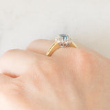 Anello a margherita vintage in oro giallo 9K con topazio azzurro (0.55ct ca.) e diamanti (0.05ctw ca.)