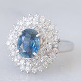 Anello a margherita vintage in platino con zaffiro (1.54ct) e diamanti (1.01ctw), anni ‘80