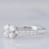 Anello a fiore vintage in platino con diamanti di taglio brillante (0.45ctw), anni ‘90