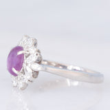Anello a margherita vintage in platino con rubino (1.61ct) e diamanti (0.60ctw), anni ‘80/‘90