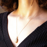 Vintage necklace with 9K yellow gold chain and 9K yellow gold pendant and green jasperware, 1982