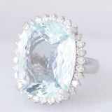Anello a margherita vintage in platino con acquamarina (17.93ct) e diamanti (1ctw), anni ‘70/‘80