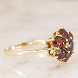 Anello a fiore vintage in oro giallo 8K con granati (1.10ctw ca.), anni ‘70