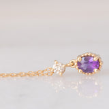 Collana vintage in oro giallo 10K con punto luce con ametista e diamante