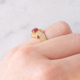 Anello a margherita vintage in oro giallo 18K con rubino (0.51ct) e diamanti (0.41ctw), anni ‘80/‘90