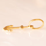 Halskette mit vergoldeter Silberkette und drei Anhängern in Form eines Delfins aus 18-karätigem Gelbgold, eines Ankers aus 18-karätigem Gelbgold und einer Schildkröte aus 14-karätigem Gelbgold