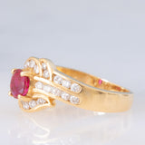 Anello a margherita vintage in oro giallo 18K con rubino (0.51ct) e diamanti (0.41ctw), anni ‘80/‘90