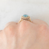 Anello a margherita vintage in oro giallo 9K con topazio azzurro (1.50ct ca.) e diamanti (0.10ctw ca.), anno 1988