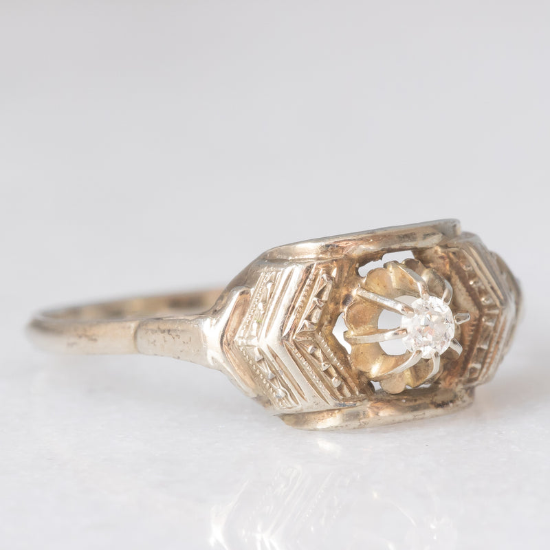 Solitario Art Déco in oro bianco 14K con diamante di taglio brillante (0.05ct ca.), anni ‘30