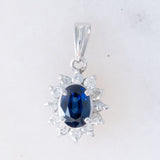 Ciondolo a margherita vintage in platino con zaffiro (0.64ct) e diamanti (0.23ctw)