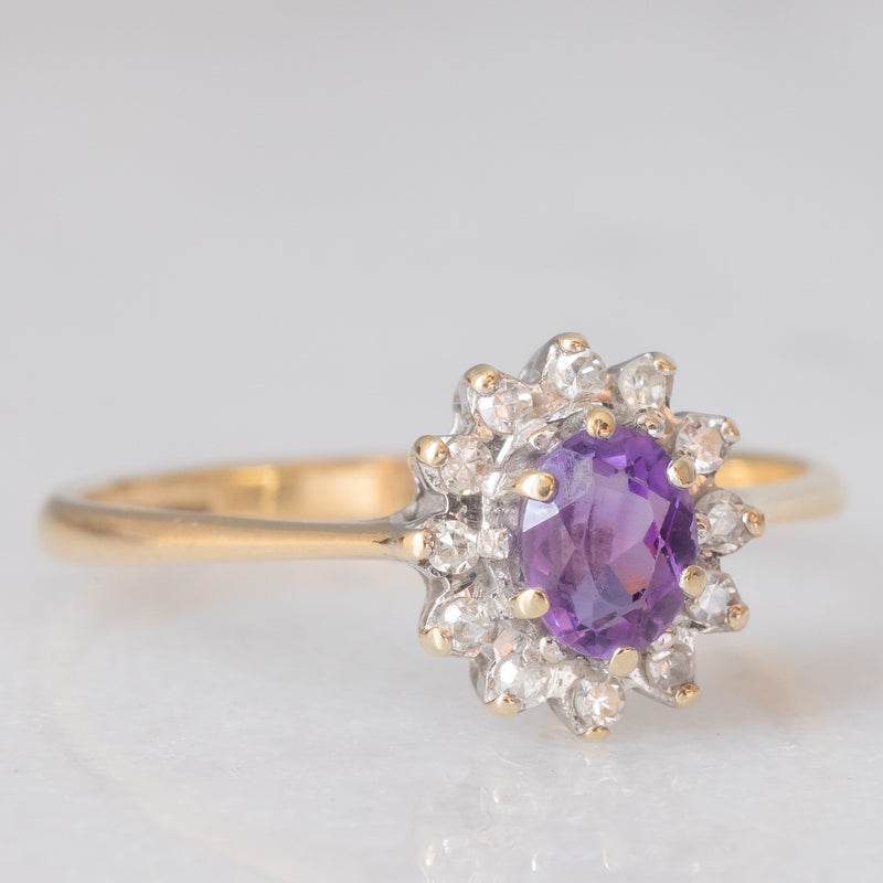 Anello a margherita in oro giallo 9K con ametista (0.35ct ca.) e diamanti (0.06ctw ca.), anno 1987