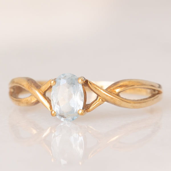 Anello vintage in oro giallo 9K con topazio azzurro (0.40ct ca.), anni ‘70/‘80