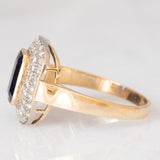 Anello a margherita vintage in oro giallo 18K con zaffiro e diamanti di taglio brillante (0.30ctw ca.), anni ‘70