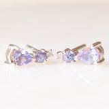 Point light earrings in 9K white gold with tanzanites (approx. 0.22ctw) and diamonds, 80s