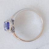 Anello a margherita vintage in oro bianco 18K con tanzanite (2.30ct ca.) e diamanti di taglio brillante (0.20ctw ca.), anno ‘70/‘80