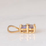 Coppia di ciondoli vintage in oro giallo 9K con tanzaniti e diamante e in oro giallo 8K con tanzaniti e peridoti