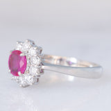Anello a margherita vintage in platino con rubino (0.33ct) e diamanti (0.57ctw), anni ‘70