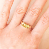 Vintage-Trilogie aus 9-karätigem Gelbgold mit Peridoten (ca. 1 Karat), Jahr 1997