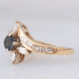 Anello a fiore vintage in oro giallo 14K con zaffiro (0.50ct ca.) e diamanti (0.90ctw ca.), anni ‘70/‘80