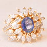 Vintage 18K yellow gold ring with sapphire (1.20ct approx.) and marquise and baguette cut diamonds (2.70ctw approx.), 70s