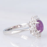 Anello a margherita vintage in platino con rubino (1.61ct) e diamanti (0.60ctw), anni ‘80/‘90