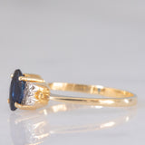 Anello vintage in oro giallo 18K con zaffiro (0.35ct ca.) e diamanti (0.04ctw ca.)