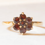 Vintage Gänseblümchenring aus 9-karätigem Gelbgold mit Granaten, 1976