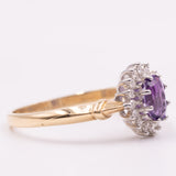 Anello a margherita vintage in oro giallo 9K con ametista (0.40ct ca.) e diamanti (0.16ctw ca.), anni ‘80/‘90