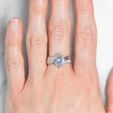 Anello a margherita vintage in platino con zaffiro stellato (0.71ct) e diamanti (0.27ctw), anni ‘80/‘90